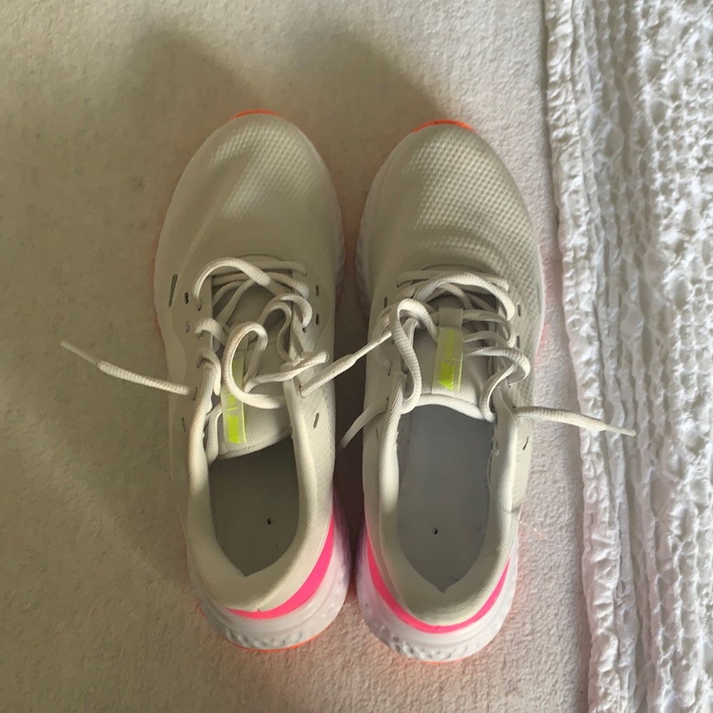 Nike revolution shoes, pink white and orange